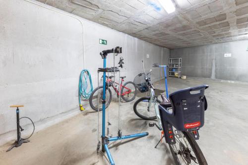 two bikes are parked in a garage at Apartaments Trainera in Esterri d'Àneu