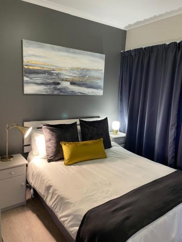 Ένα ή περισσότερα κρεβάτια σε δωμάτιο στο Aberdour Guesthouse