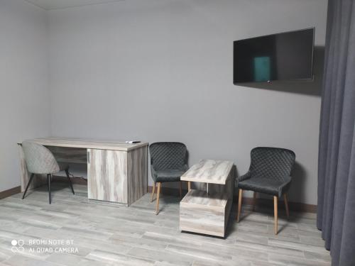 TV a/nebo společenská místnost v ubytování Bridge