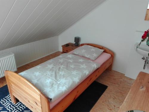Postel nebo postele na pokoji v ubytování Schwedenhaus RE25