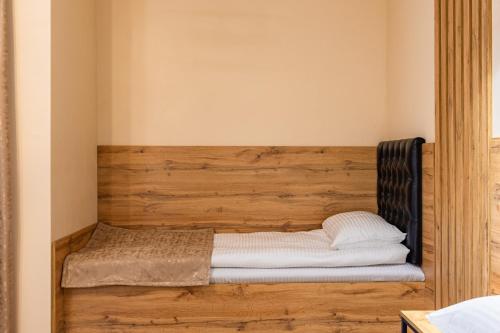 Una cama o camas en una habitación de Milana SPA & Hotel - SPA included