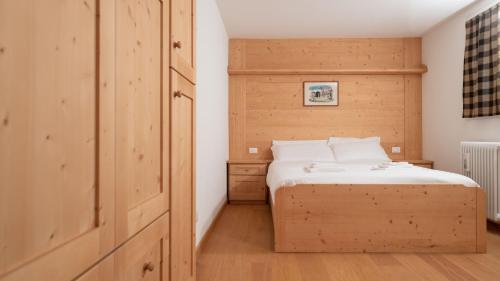 Un pat sau paturi într-o cameră la Italianway - Adda 10