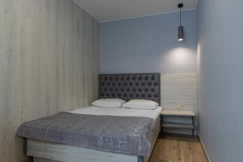 Una cama o camas en una habitación de Milana SPA & Hotel - SPA included