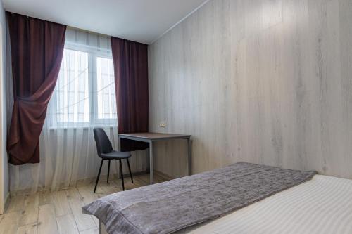 Una cama o camas en una habitación de Milana SPA & Hotel - SPA included