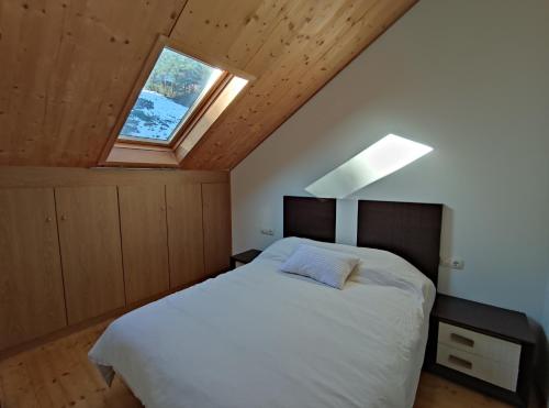 Ένα ή περισσότερα κρεβάτια σε δωμάτιο στο Apartamento Luga