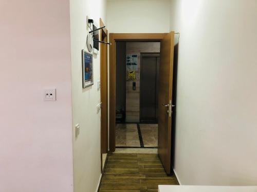 a hallway with a door leading into a room at Arti̇m Apart Hotel in Fethiye