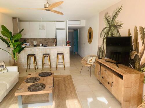 A kitchen or kitchenette at Sea Front Apartment Orient Bay