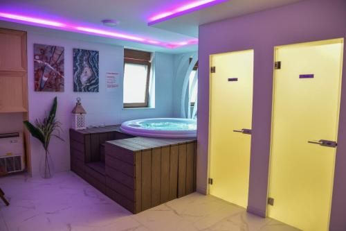 En eller flere senge i et værelse på Apartman Smokvica