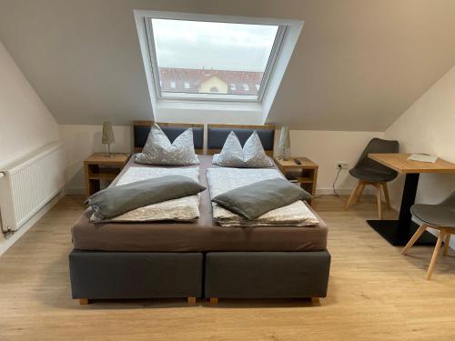 Postelja oz. postelje v sobi nastanitve Pension Rhönstüble