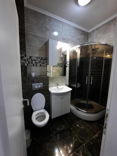 Ένα μπάνιο στο Apartman San