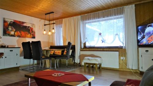 TV a/nebo společenská místnost v ubytování AlpinResort DerBacherhof