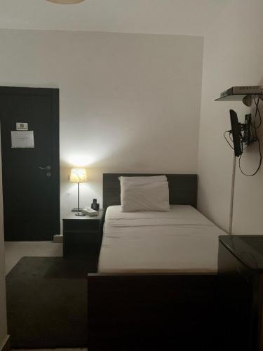 Cama o camas de una habitación en Sakan 275