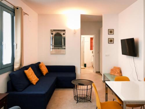 Een zitgedeelte bij Covadonga 9 Apartments - Triana