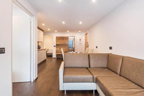 Coin salon dans l'établissement Apartment La Rodra