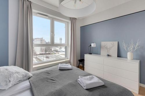Posteľ alebo postele v izbe v ubytovaní Grand Apartments - Bastion Wałowa Modern Apartament Gdańsk