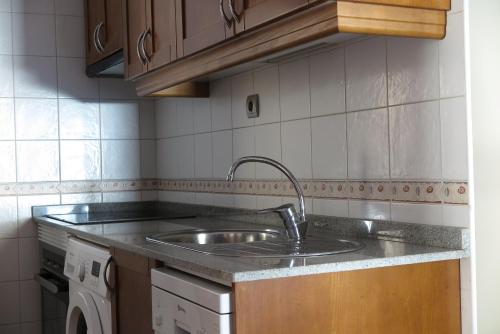Kuchyň nebo kuchyňský kout v ubytování Apartamentos Casa Pochetas