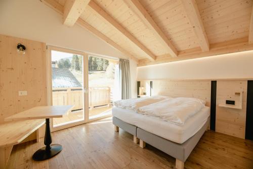 Postel nebo postele na pokoji v ubytování Garnì Aurora Bed and Breakfast