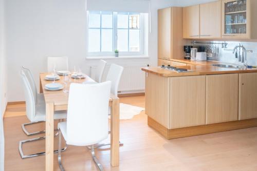 Η κουζίνα ή μικρή κουζίνα στο Schmitten & cityXpress Apartment 1 and 2
