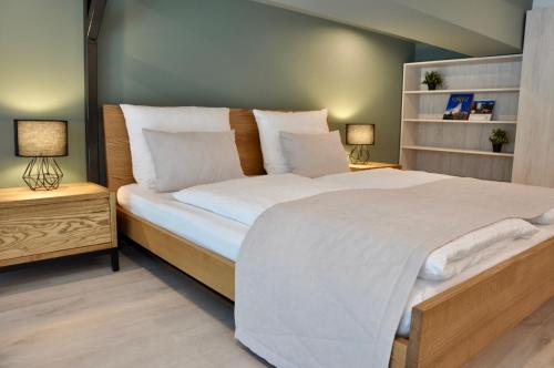 Postel nebo postele na pokoji v ubytování The Loft Interlaken