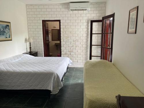 Barequeçaba Praia Hotelにあるベッド