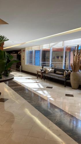 a large living room with a couch in a building at Eurobuilding Express Maracay in Maracay