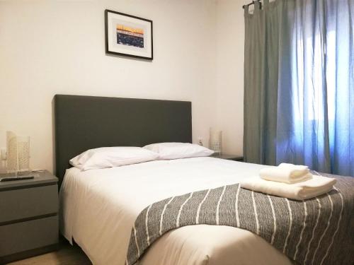 Кровать или кровати в номере Cascais Bela House