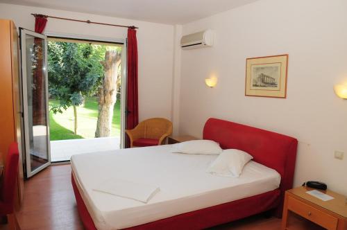 Ένα ή περισσότερα κρεβάτια σε δωμάτιο στο Hotel Pantheon