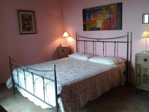 Ένα ή περισσότερα κρεβάτια σε δωμάτιο στο Agriturismo Cantinaccia di Sopra