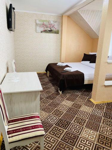 Postel nebo postele na pokoji v ubytování Під явором NEW