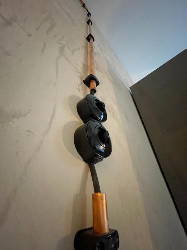 a traffic light hanging from the side of a wall at König Albert Industrie Loft in Bitterfeld