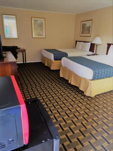 Katil atau katil-katil dalam bilik di Grandview Plaza Inn