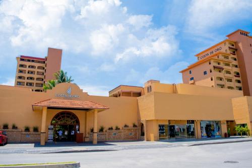 a view of the hotel from the street at Costa de Oro Beach Hotel in Mazatlán