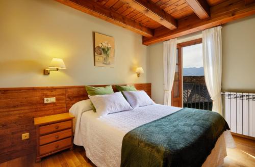 מיטה או מיטות בחדר ב-Cal Francès