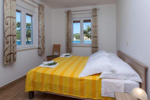 Katil atau katil-katil dalam bilik di Apartments Zvone1 - at the water front