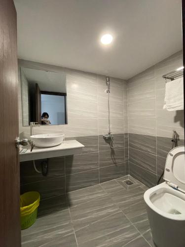 Ένα μπάνιο στο Smiley Apartment Quận 2