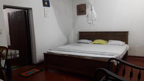 Krevet ili kreveti u jedinici u objektu Colonial Surfing Villa Hostel & Home Stay