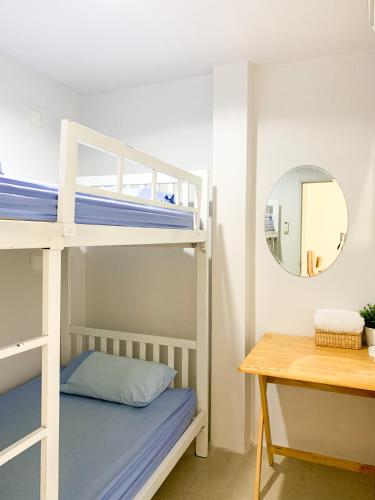 Llit o llits en una habitació de 1sabai