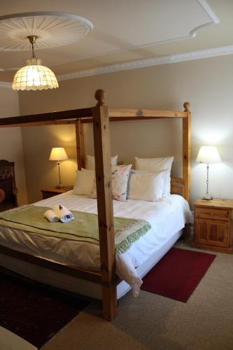 Кровать или кровати в номере Florentia Guest House