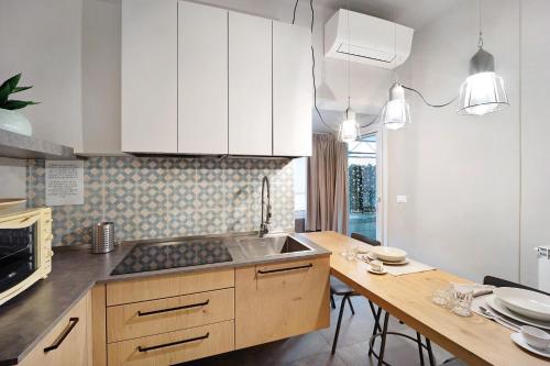 Dapur atau dapur kecil di Victoria Apartments Tempi moderni