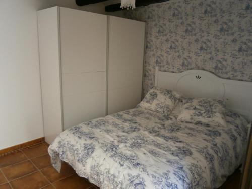 Tempat tidur dalam kamar di JUNTO AL PILAR