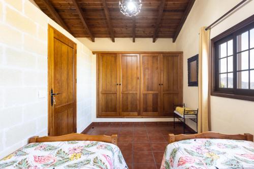 Una cama o camas en una habitación de Home2Book Las Mimbreras