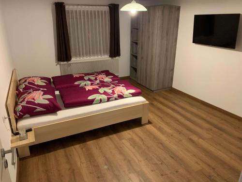 Postel nebo postele na pokoji v ubytování Ferienhaus "frainerei"