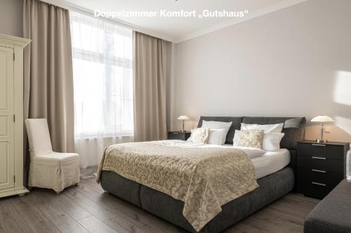 เตียงในห้องที่ Gutshof Havelland