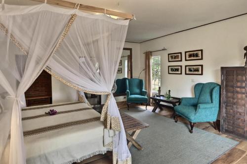Ένα ή περισσότερα κρεβάτια σε δωμάτιο στο Olerai Lodge