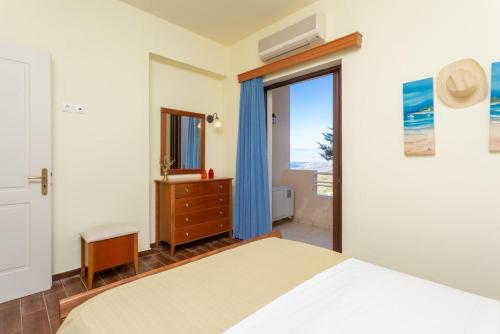 Ένα ή περισσότερα κρεβάτια σε δωμάτιο στο Villa Selini