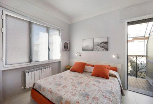 En eller flere senge i et værelse på Victoria Apartments Mediterraneo