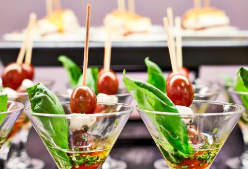 a row of glasses of food with cherries in them at Globales Los Delfines in Cala en Blanes