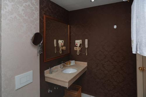 Ванная комната в Teatro Boutique Hotel
