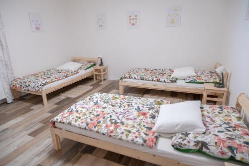 Postel nebo postele na pokoji v ubytování Jachovka