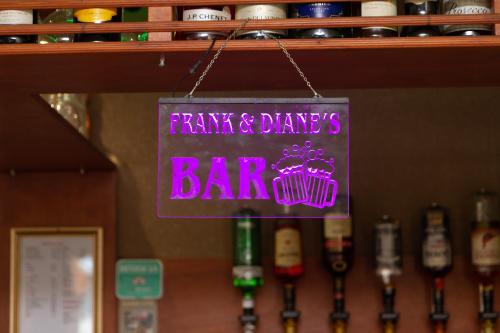 a sign that says farm and dances bar at The Almeria in Blackpool
